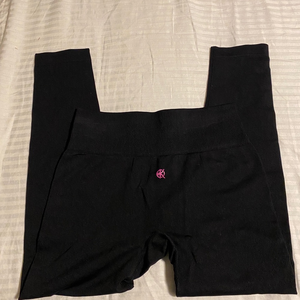 Brand is katya. Size small and black. Compressive